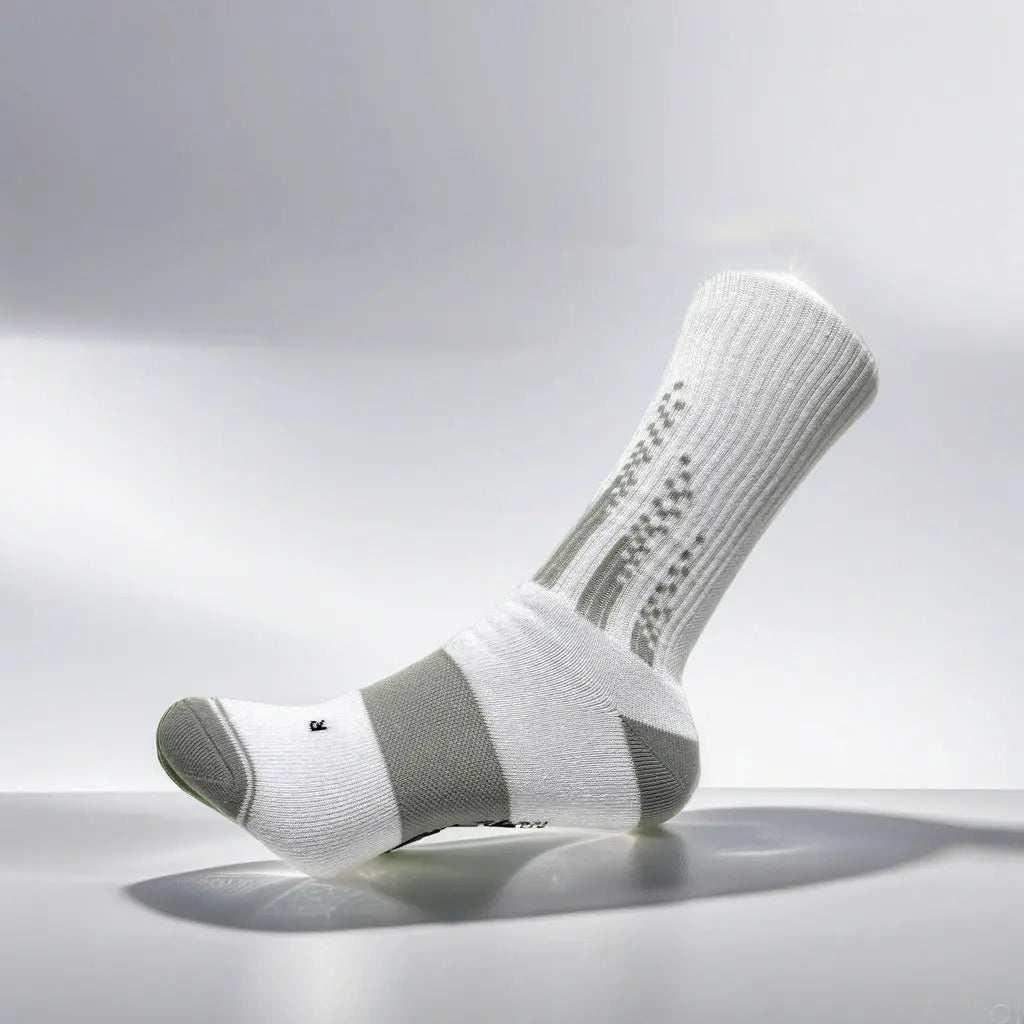 White and grey crew pickleball socks with enhanced grip and cushioning for court performance