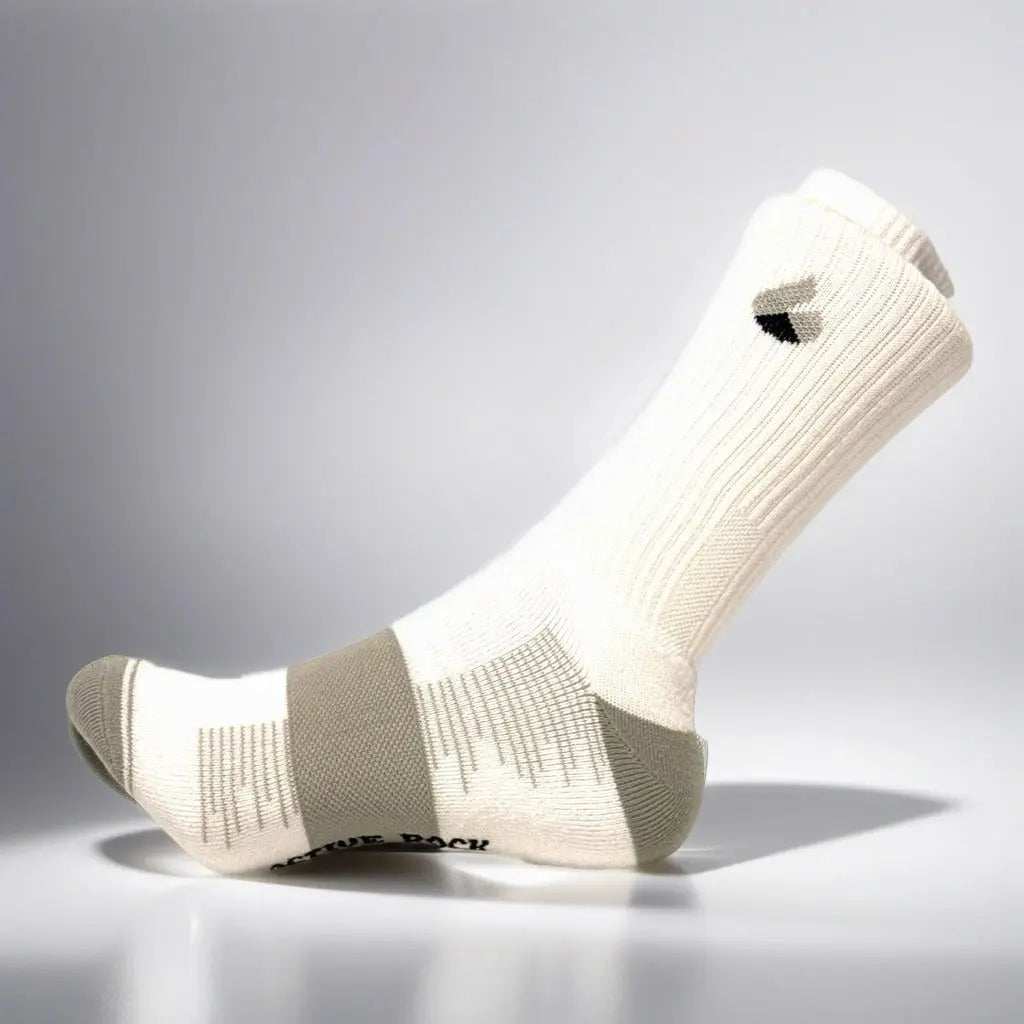 Tennis socks in white and grey with crew length, designed for summer performance and ventilation.